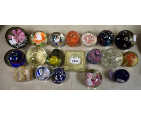 Paperweights - a Caithness blue and red bubble globe weight; others floral, spiral, pear, etc.; a carved onyx weight