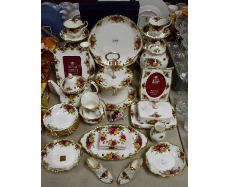 A Royal Albert Old Country Roses table service for six, including teapot, cream jug, sugar bowl, cups, saucers, side plates, 