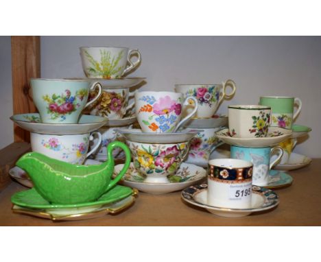 A Staffordshire Grafton floral teacup and saucer; other Staffordshire printed and painted teacups and saucers; Shelley, Royal