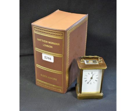 A brass carriage clock, Matthew Norman box