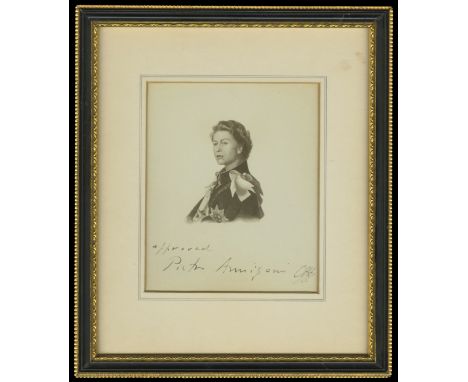A Framed Vignette of Her Majesty the Queen, after the 1955 portrait by Pietro Annigoni, and hand signed and approved by the a