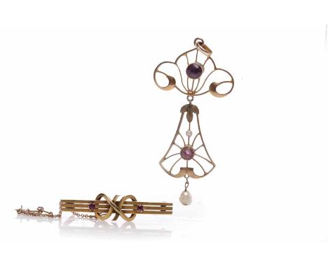 EARLY TWENTIETH CENTURY AMETHYST PENDANTof openwork form, set with round amethysts, in nine carat gold, together with a fifte