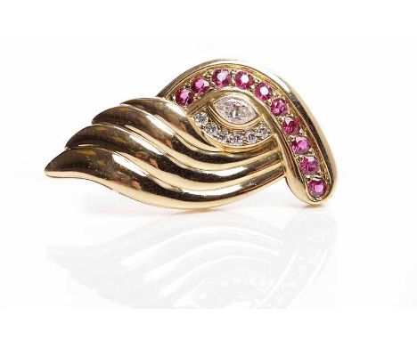 UNUSUAL EIGHTEEN CARAT GOLD RUBY AND DIAMOND SET PENDANTset with a single marquise cut diamond of approximately 0.25 carats a