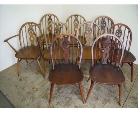 Set of nine (7 + 2) Ercol stick back dining chairs