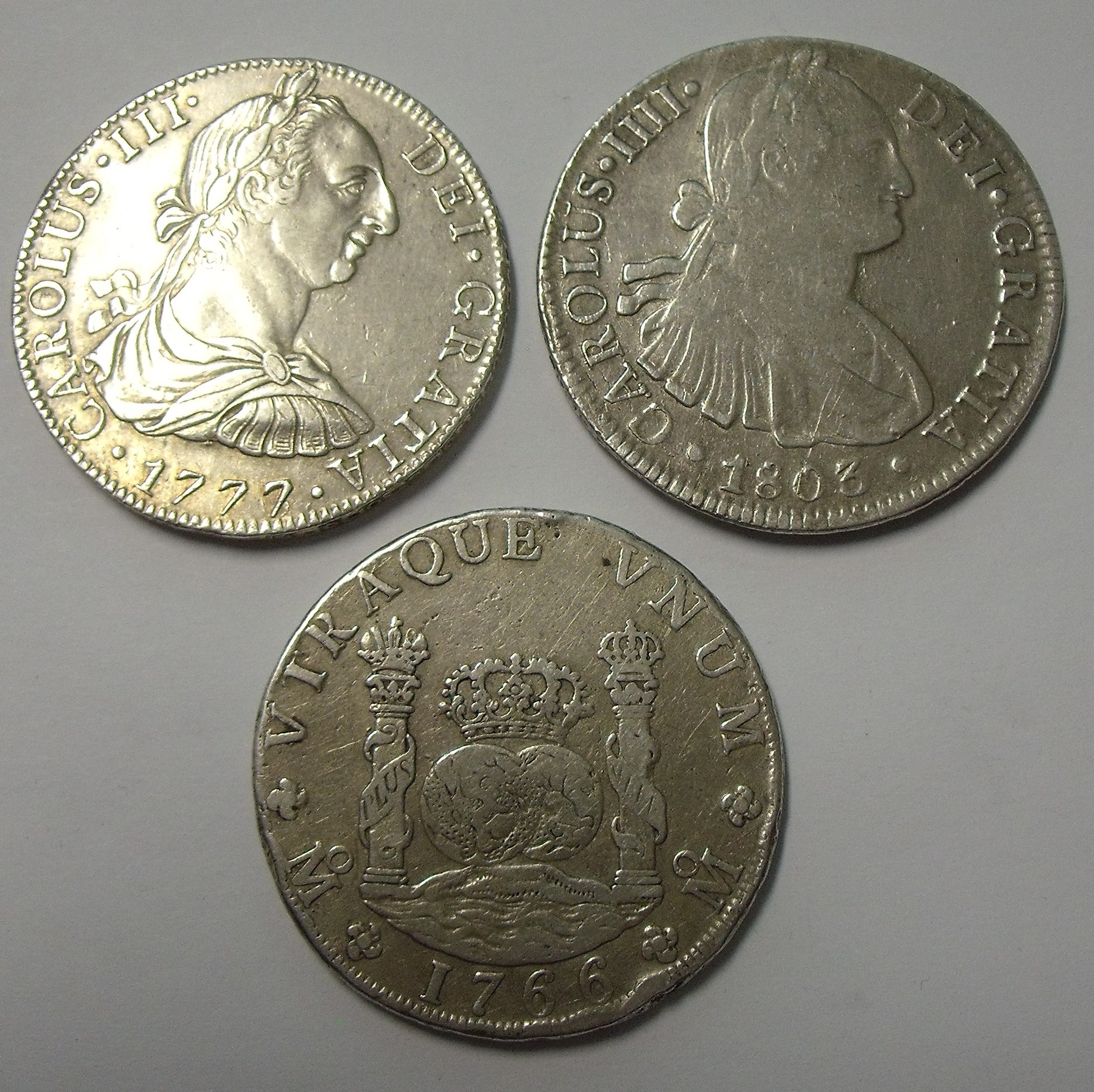 Two Carolus III 1766 and 1777 silver coins and a Carolus IIII 1803 coin (3)