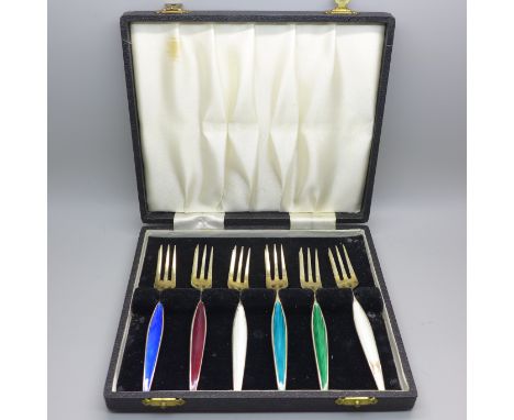 A cased set of six Danish silver and coloured enamel forks, enamel on one white fork a/f 