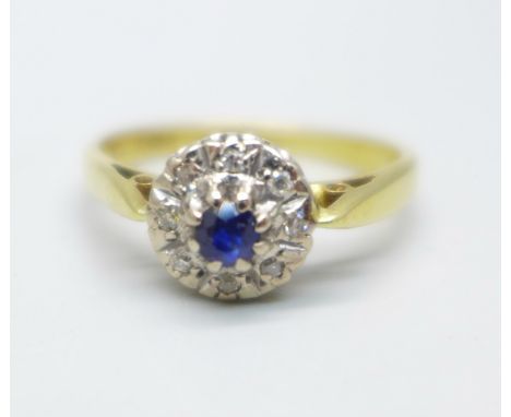 An 18ct gold, sapphire and diamond cluster ring, 3.9g, R 