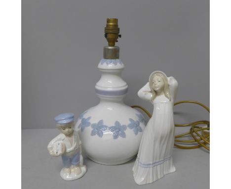 A Lladro table lamp base, a D'Art Spanish figure and one other figure 