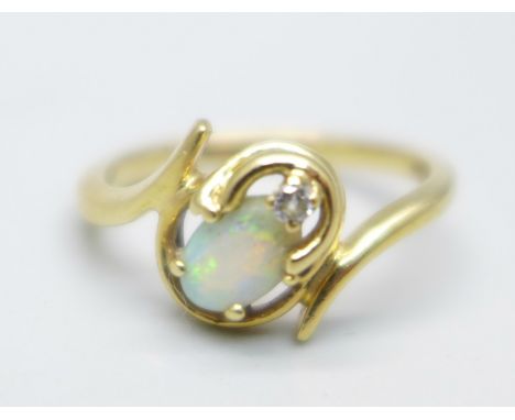 A 14k gold, opal and diamond ring, 2.4g, L 