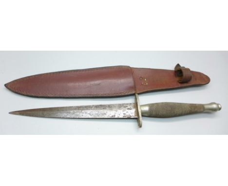 A Commando dagger with scabbard 