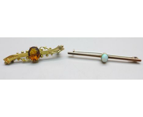 Two 9ct gold brooches; one set with a citrine and dated Birmingham 1901 and one set with an opal, total weight 5.3g, metal pi