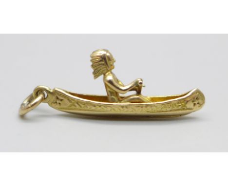 A hallmarked 9ct gold canoe charm with Native American, 2.4g 