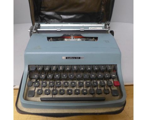 A cased Olivetti Lettera 32 typewriter **PLEASE NOTE THIS LOT IS NOT ELIGIBLE FOR POSTING AND PACKING** 