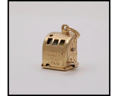 Vintage Slot Machine Moveable 14K Yellow Gold Pendant Charm.           Metal: 14K Yellow Gold stamped Weight: 6.3 Grams Size: