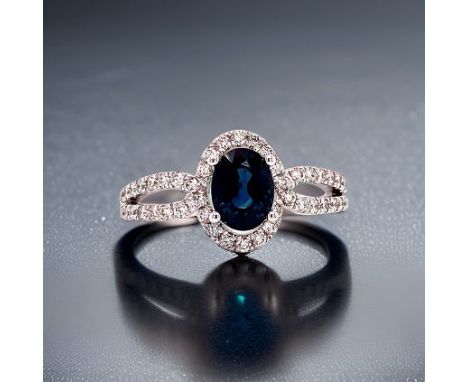 HMA Creations 1.00 Ct Sapphire And Diamond Ring.            HMA Halo Ring, 1 Oval Sapphire 1.00 cttw, Round Diamond 0.45 cttw