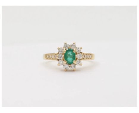Vintage Cluster Emerald Diamonds 18K Yellow Gold Ring                 Stones: Emerald ( approx. 0.40 carat) Diamonds ( 10 at 