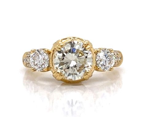 18K Yellow Gold EGL Certified Diamond Ring.          Weighing 5.6 grams Set with a 1.41 Ct. EGL Certified Diamond J Color, SI