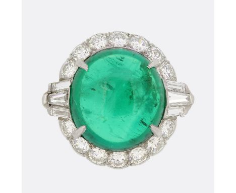 Natural 8.40 Carat Columbian Emerald and Diamond Ring.       Weight:Â&nbsp;10.4 grams Ring Size:Â&nbsp;K Face Dimensions:Â&nb