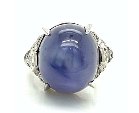Art Deco Platinum 35.00 Ct. Star Sapphire &amp; Diamond Ring.                       Weighing 10.8 grams Set with an app. 35.0