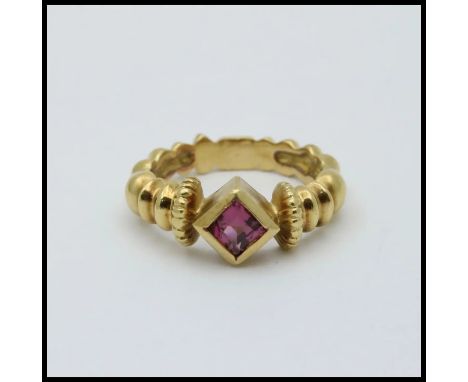 Vintage 18K Yellow Gold Garnet Bohemian Style Band.                     Metal: 18K Yellow Gold Weight: 5.6 grams Garnet : 4 m