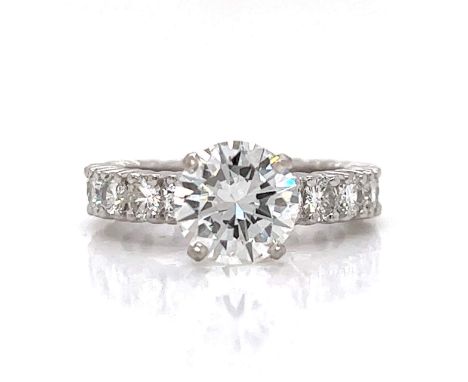 Platinum GIA Certified 2.15 Ct. Diamond Ring Weighing 7.9 grams Set with a GIA Certified 2.15 Ct. Round Diamond H Color, SI1 