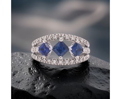De Hago Sapphire And Diamond 18K White Gold Ring.         De Hago Ring, 3 Sapphire 0.92 cttw, Round Diamond 0.34 cttw, 18K Wh