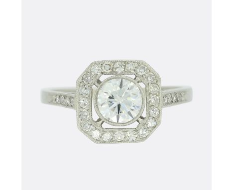 Art Deco Style 0.70 Carat Diamond Cluster Ring.              Weight:Â&nbsp;3.7 grams UK Ring Size:Â&nbsp;M Central Diamond Ca
