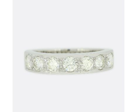 1.05 Carat Diamond Half Eternity Ring.      Weight:Â&nbsp;5.7 grams Size:Â&nbsp;P (56) Band Width:Â&nbsp;5mm - 2.5mm Total Di