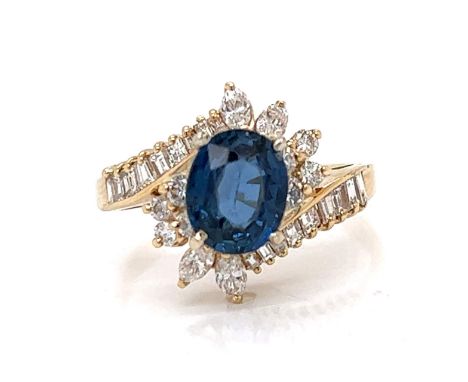 14K Yellow Gold 2.20 Ct. Sapphire &amp; Diamond Ring Weighing 4.2 grams Set with an app. 2.20 Ct. Sapphire Along with 30 Diam