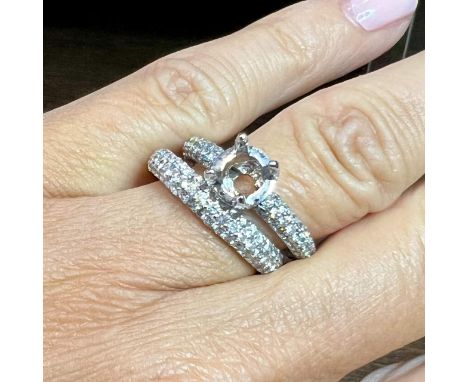 Engagement Mounting and Anniversary Ring Set.                         Weighing 11.4 grams Set with app. 3.75 Ct. of Diamonds 