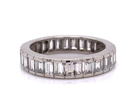 Art Deco 5.50 Ct. Diamond Eternity Band.                        Weighing 7.3 grams Set with 30 Baguette Diamonds weighing app