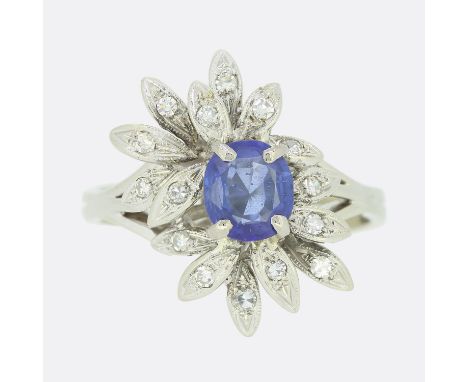 Vintage Sapphire and Diamond Cluster Ring.             Weight:Â&nbsp;6.2 grams Size:Â&nbsp;S Face Dimensions:Â&nbsp;20mm x 15
