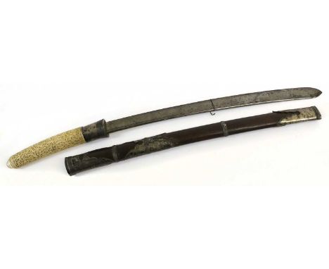 A 19th Century Burmese Dha, the 52cm broad single edge fullered steel blade with a narrow fuller to the back edge, with broad