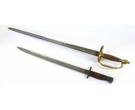An 18th Century Small Sword, with 60cm single edge fullered steel blade, the brass stirrup hilt with fixed double shell guard