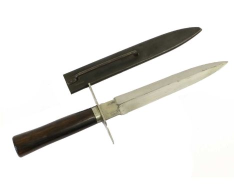 A First World War French Fighting Knife, the 16.5cm double edge leaf shape steel blade stamped with maker's mark of the head 