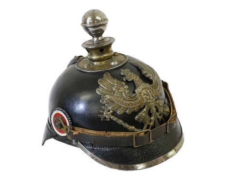 A First World War Prussian Artillery EM's Kugelhelm, in black leather with magnetic silvered metal fittings of detachable bal