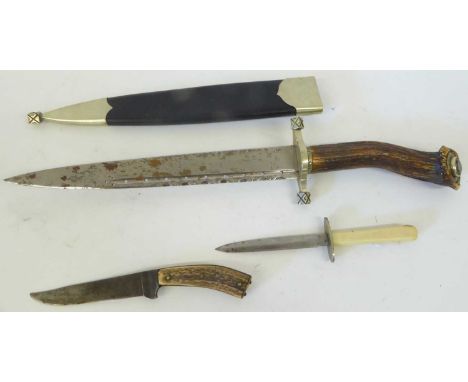 A Scottish Dirk, the 27.5cm scallop back single edge steel blade with pierced narrow fuller, faintly etched with martial trop
