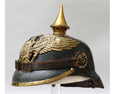 A First World War Prussian Garde Pioneer EM's Pickelhaube, in black leather with gilt brass fittings of a spike with five ven