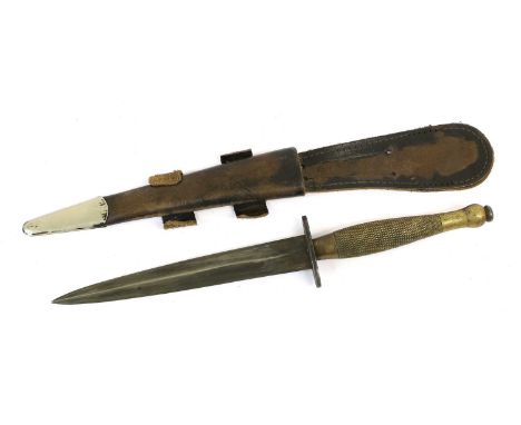 A Second Pattern Fighting Knife, with 17cm unmarked machine forged steel blade, plain steel crossguard, brass knurled gip and