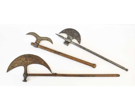 A Late 18th /Early 19th Century Indian Tabar Battle Axe, the crescent shape blade engraved and etched with seated figures and