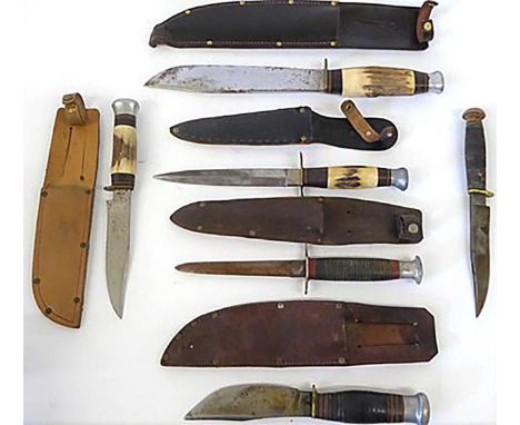 A Bowie Knife by J Nowill &amp; Sons, Sheffield, with 20cm signed clip-point steel blade, brass crossguard and staghorn grip,