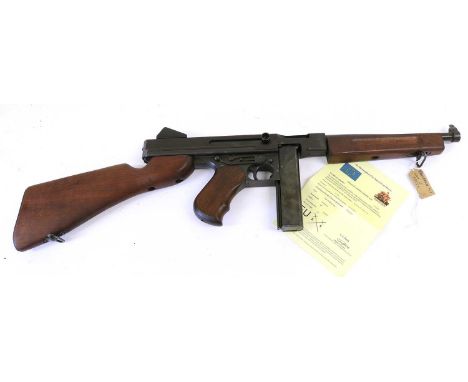 A Deactivated Thompson M1A1 Submachine Gun, .45 calibre, no.140547, with wood fore-end, grip and stock, detachable stick maga