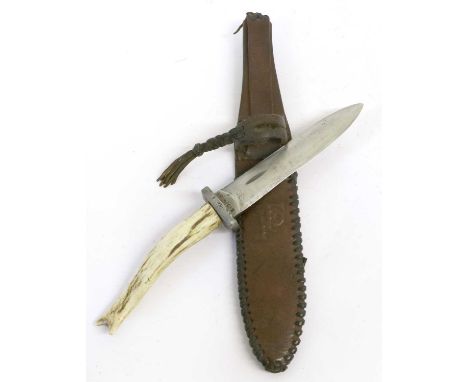 An Early 20th Century German Hunting/Trench Dagger, the 14cm double edge steel blade stamped E.PACK &amp; S. to one side of t