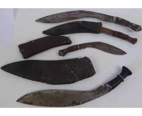 An Early 20th Century Nepalese Kukri, the 36cm blade with narrow double fuller to the back edge, blade knopped wood grip with