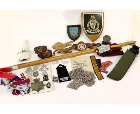 A Quantity of Militaria, including a gas mask, helmet spikes and fittings, a pair of chainmail epaulettes, Warrant Officer's 