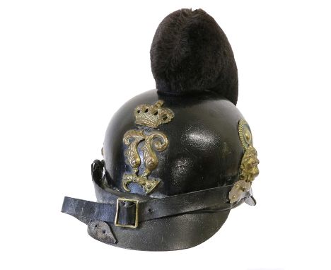 A Bavarian Dragoon Officer's Black Leather Helmet, (Raupenhelm), circa 1870, with one-piece skull surmounted by a black wool 