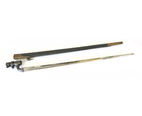 A British 1876 Pattern Martini Henry Socket Bayonet, the 55cm triangular section fullered steel blade marked at the ricasso w
