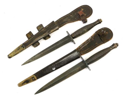 Two Third Pattern Fighting Knives, each with 17.5cm machine forged blued steel blade, steel crossguard, one stamped R.COOPER 