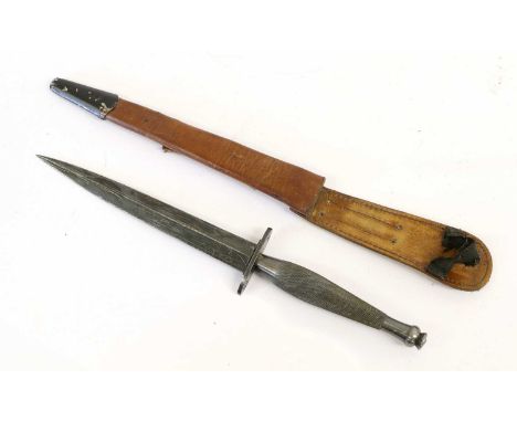 A Second Pattern Fighting Knife, with blackened finish, 17cm unmarked machine forged steel blade, the steel crossguard stampe
