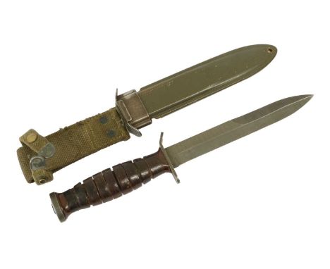 A US M3 Fighting Knife by Imperial, the unmarked 17cm steel blade double edged for the last 9cm, the crossguard stamped US M3